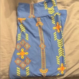 LuLaRoe Blue Leggings with Orange and Yellow Patterns